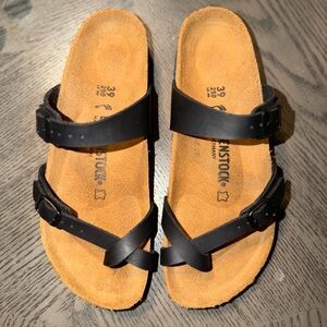 Birkenstock Black and Tan Cross-Strap Sandals